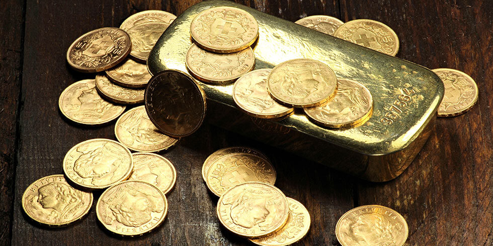 Goldmünzen mit Goldbarren